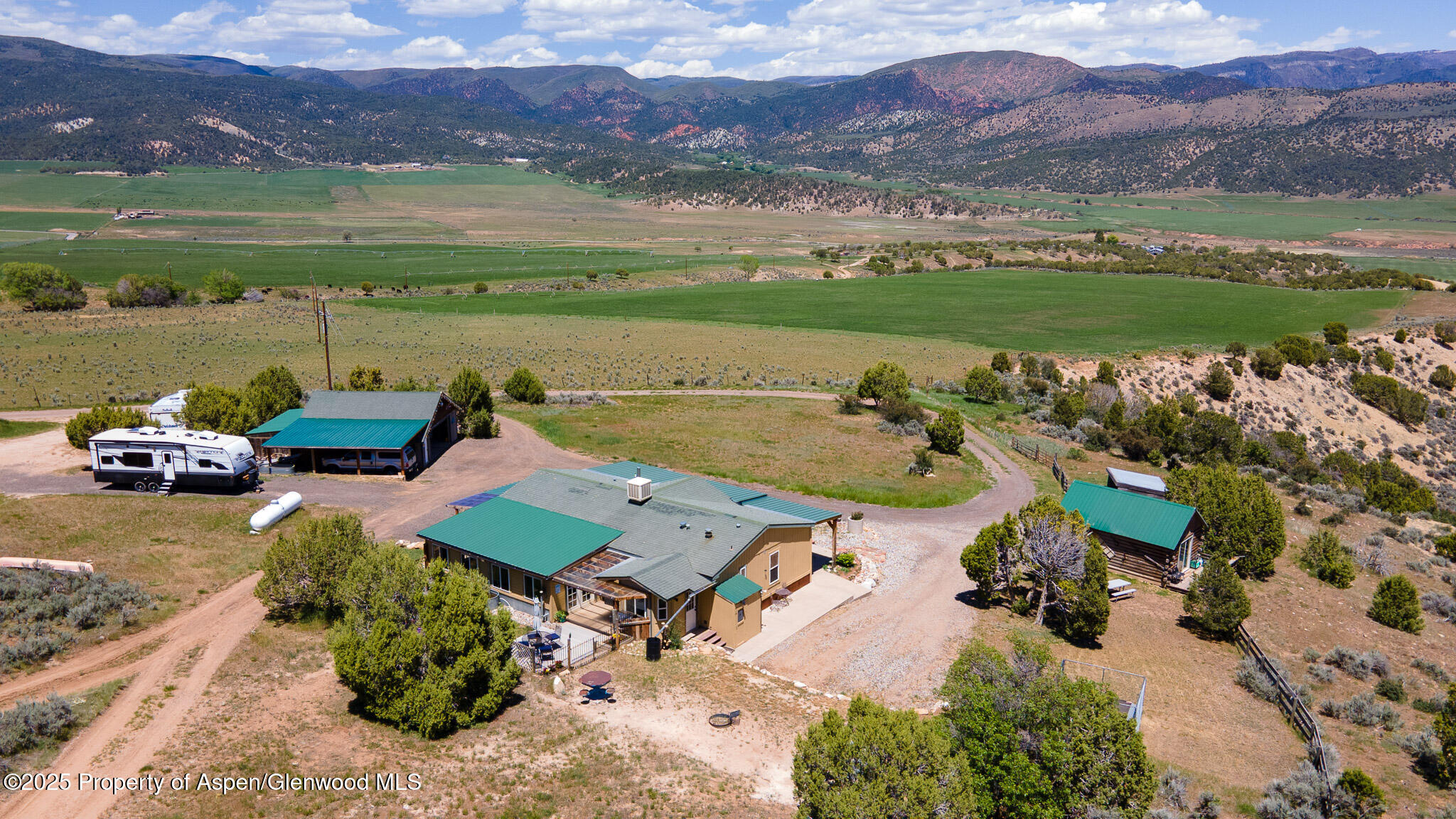 3768 County Road 237 Rifle, CO 81650 - Photo 21 of 47 an aerial view of a house with outdoor space swimming pool