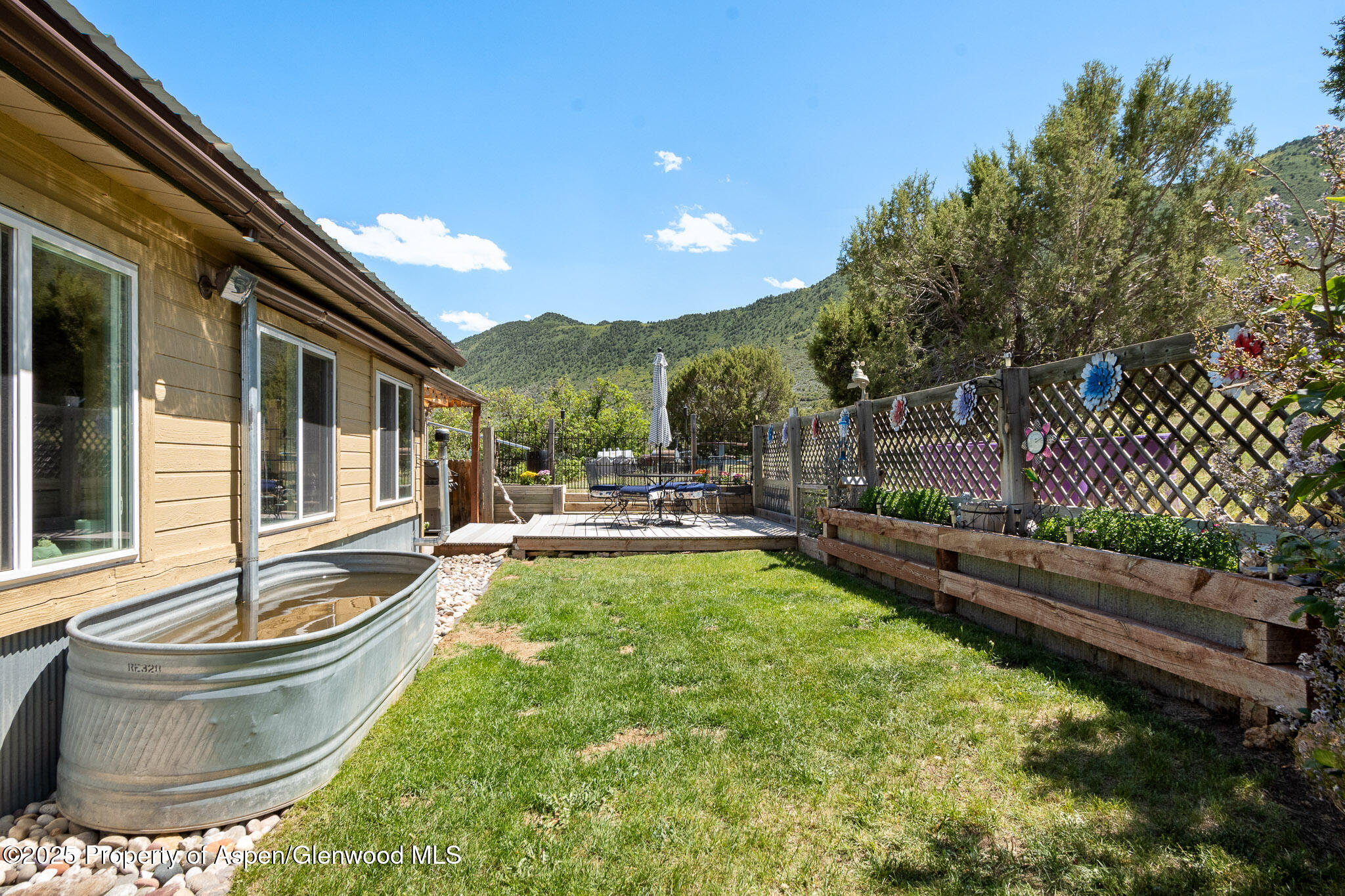 3768 County Road 237 Rifle, CO 81650 - Photo 25 of 47 a view of swimming pool with outdoor seating and plants