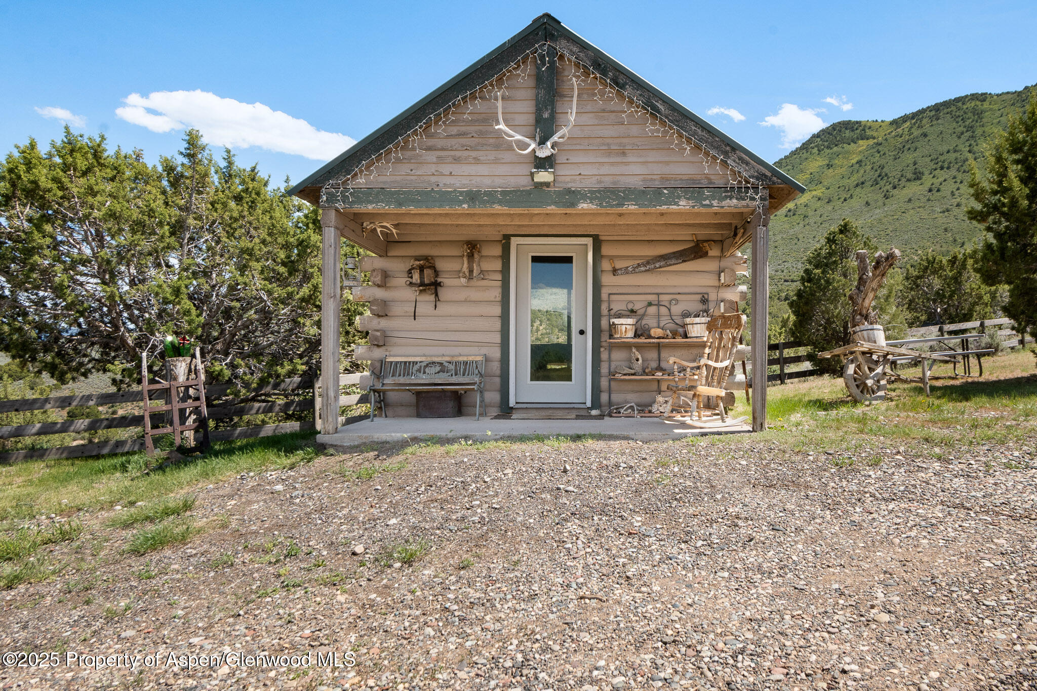 3768 County Road 237 Rifle, CO 81650 - Photo 26 of 47 a front view of a house with a yard