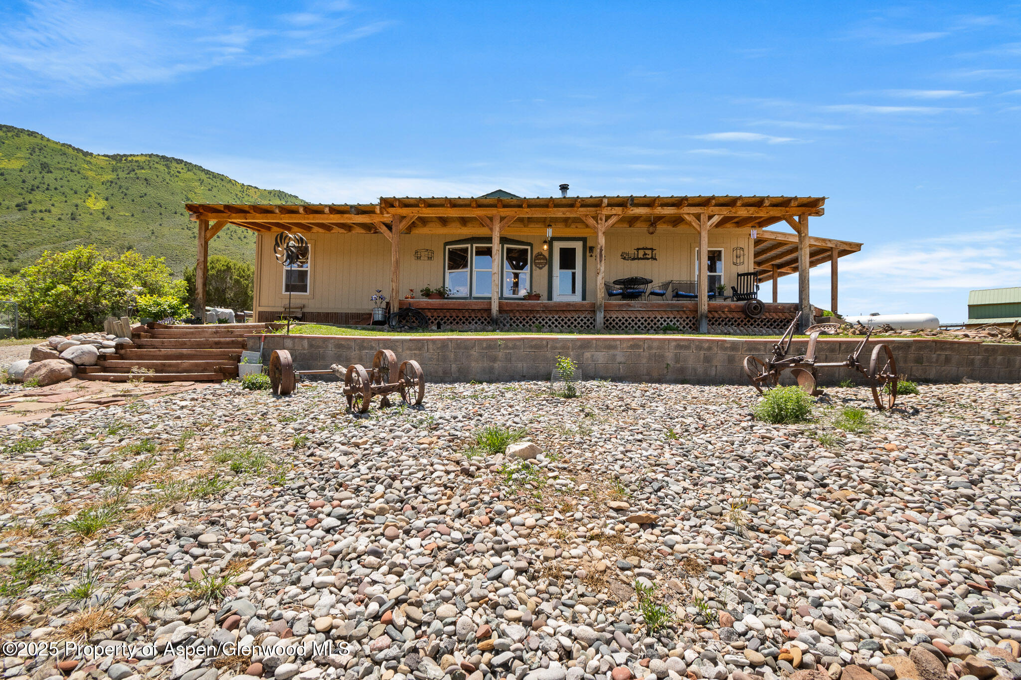 3768 County Road 237 Rifle, CO 81650 - Photo 3 of 47 front view of a house with a yard