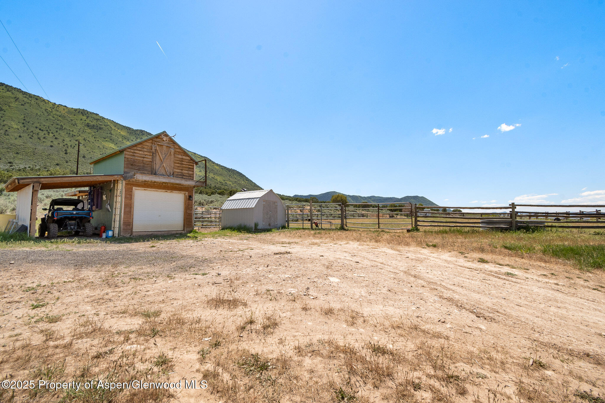 3768 County Road 237 Rifle, CO 81650 - Photo 31 of 47 a view of a house with a lake and mountain view