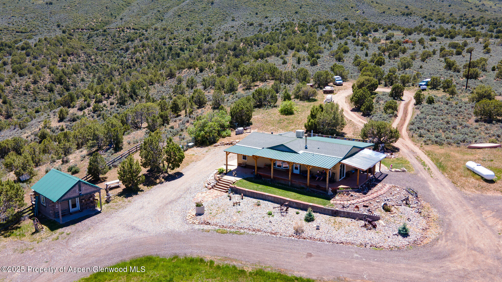 3768 County Road 237 Rifle, CO 81650 - Photo 34 of 47 an aerial view of a house with a yard basket ball court and outdoor seating
