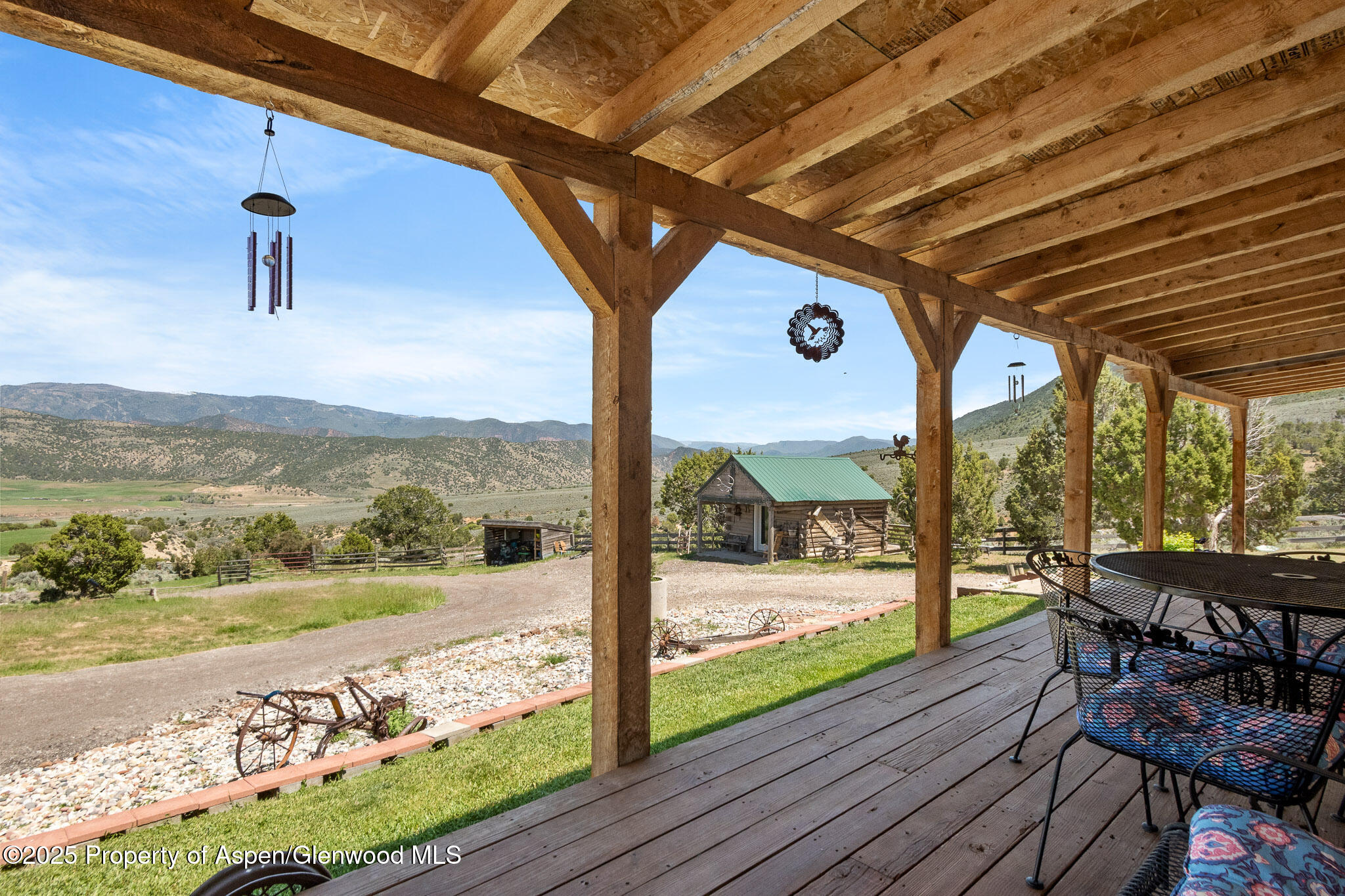 3768 County Road 237 Rifle, CO 81650 - Photo 5 of 47 a view of a porch with furniture and wooden floor