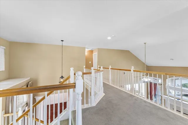 a view of a hallway with windows