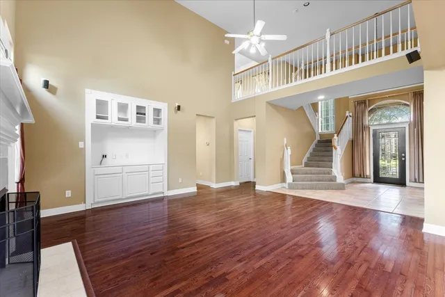 a view of an entryway with wooden floor