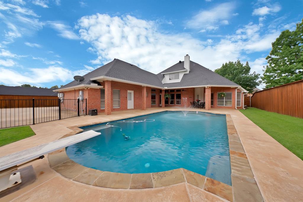 1110 McCampbell Road Mansfield, TX 76063 - Photo 5 of 39 a view of a house with a swimming pool