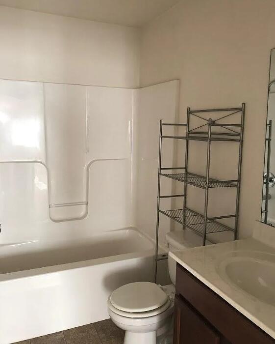 640 Old Fort Road Rocky Mount, VA 24151 - Photo 19 of 20 a bathroom with a sink a toilet and shower