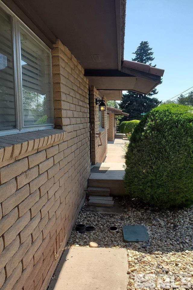 605 Lander Street Reno, NV 89509 - Photo 17 of 17 a front view of a house with a yard