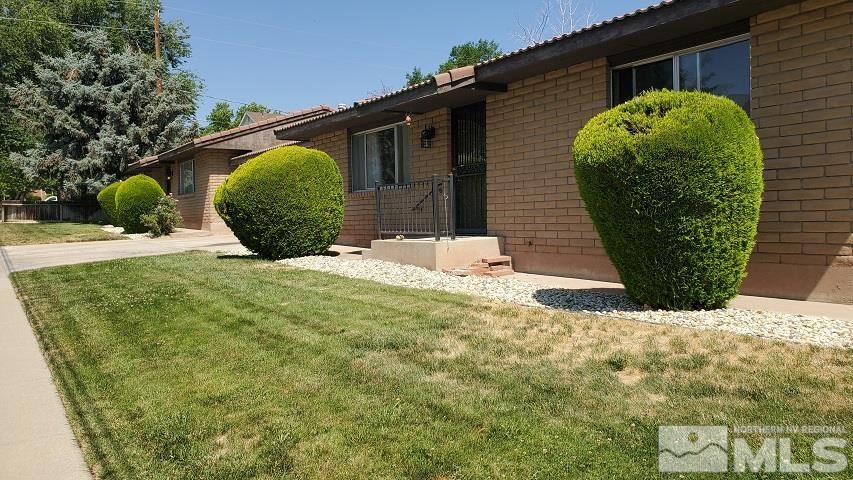 605 Lander Street Reno, NV 89509 - Photo 2 of 17 a view of a backyard of the house