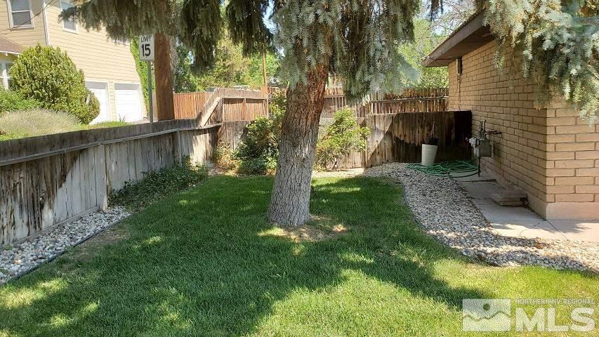 605 Lander Street Reno, NV 89509 - Photo 3 of 17 a view of backyard with green space