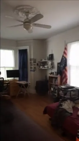 a kitchen with table and chairs in it