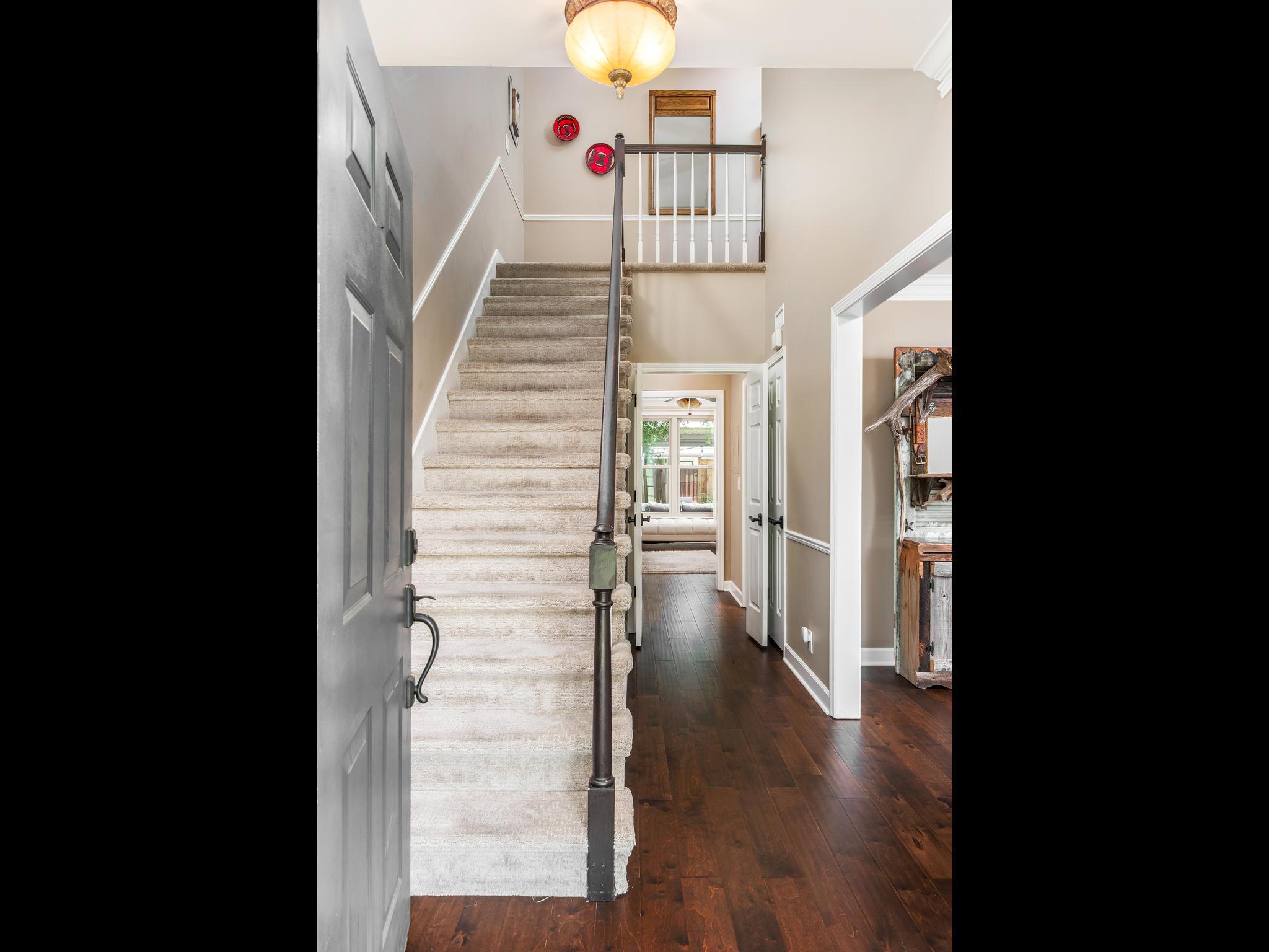 732 General George Patton Road, Unit 732 Nashville, TN 37221 - Photo 3 of 27 a view of entryway and hall with wooden floor