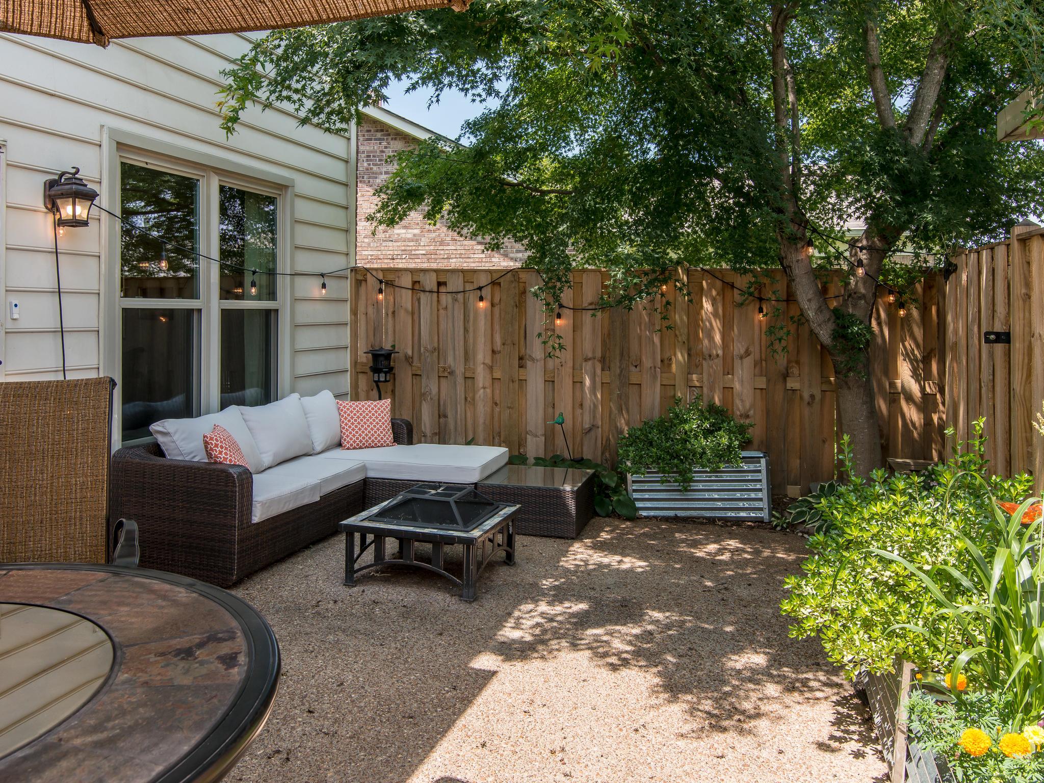 732 General George Patton Road, Unit 732 Nashville, TN 37221 - Photo 23 of 27 a view of a house with backyard and sitting area