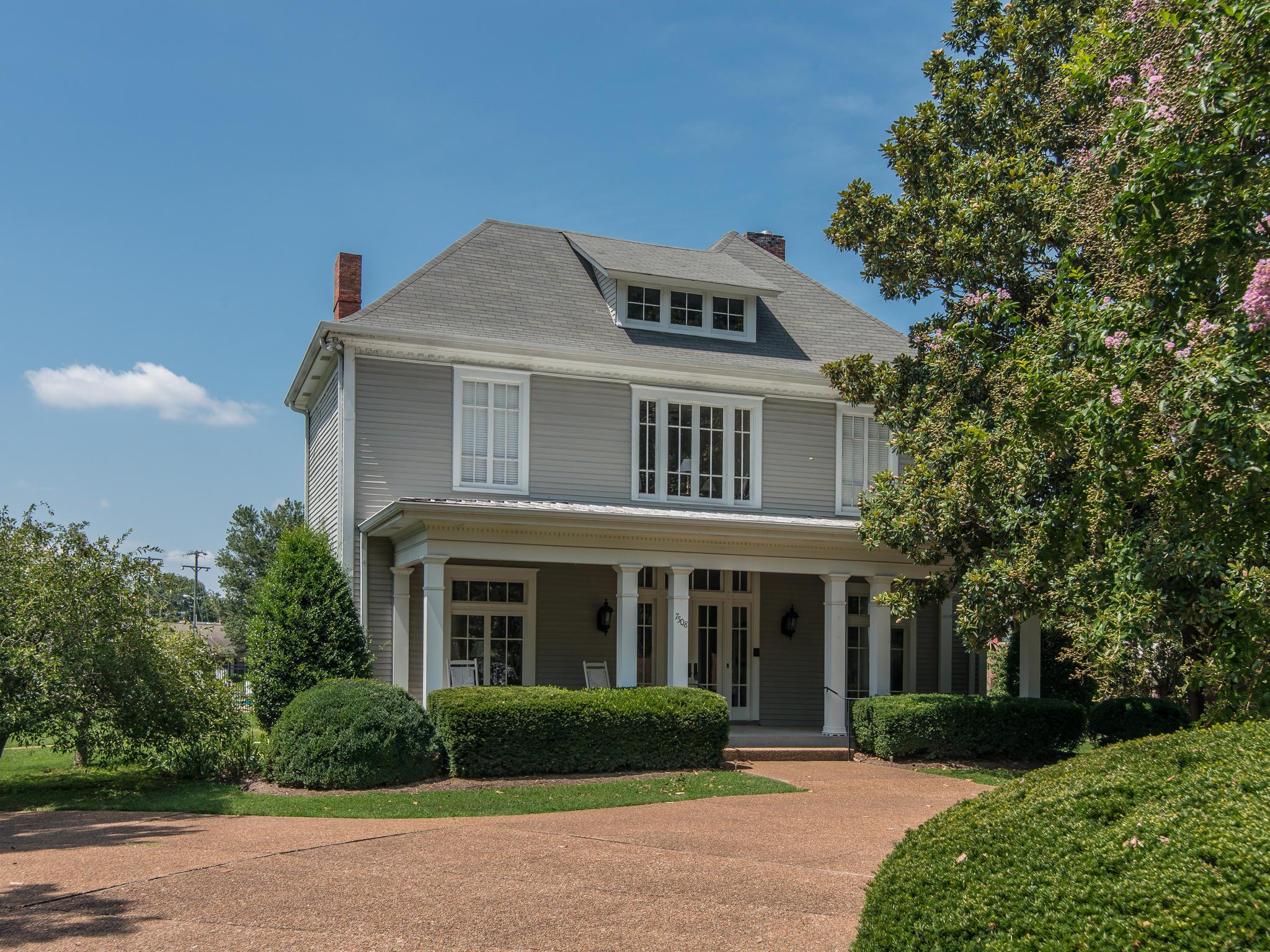 732 General George Patton Road, Unit 732 Nashville, TN 37221 - Photo 27 of 27 a front view of a house with a garden