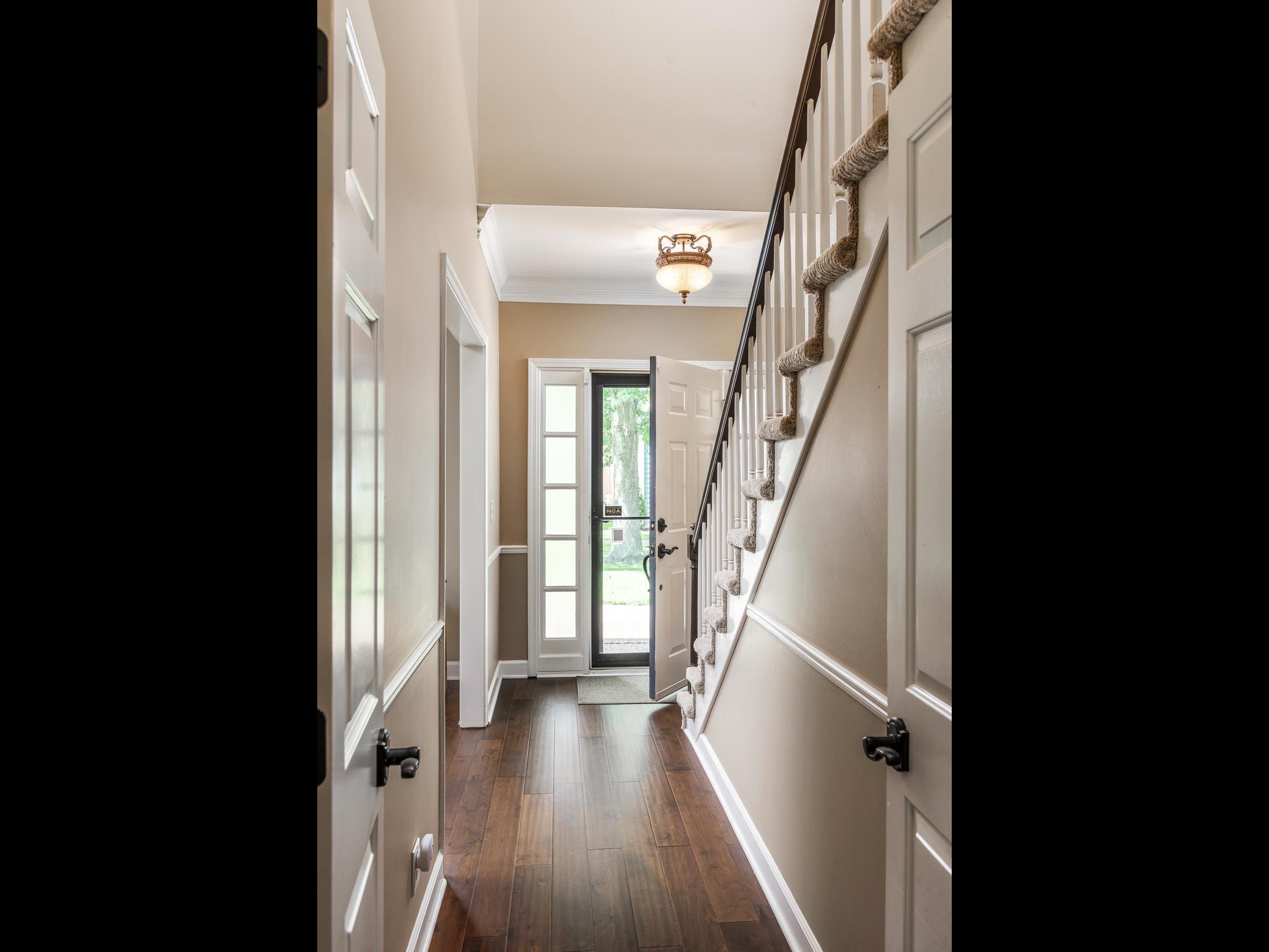 732 General George Patton Road, Unit 732 Nashville, TN 37221 - Photo 4 of 27 a view of entryway and hall with wooden floor