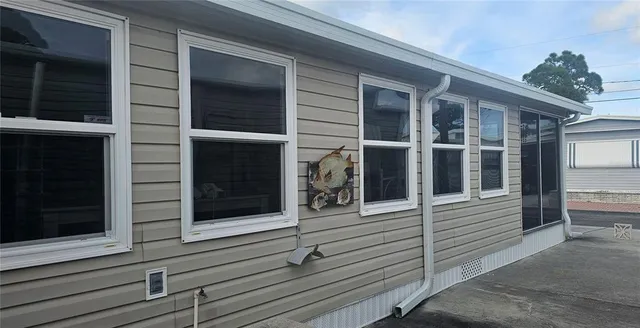 a view of a back yard of the house