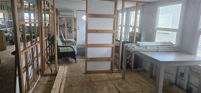 a bathroom with a sink and a window