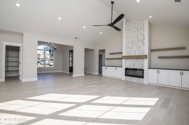 a kitchen with stainless steel appliances a sink stove and refrigerator