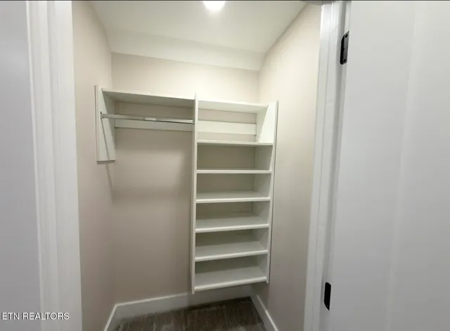 a view of a street with cars