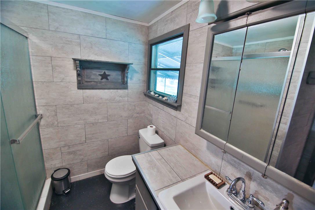 8 Cross Rds Drive Jim Thorpe, PA 18229 - Photo 15 of 32 Clean lines and modern tile create a serene and functional bathroom