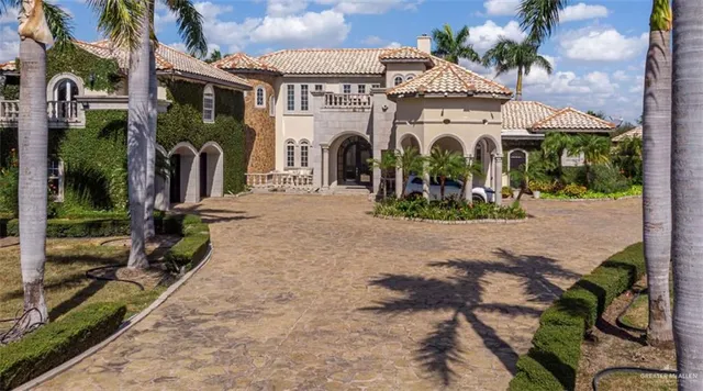 a view of a building with a pathway and a building