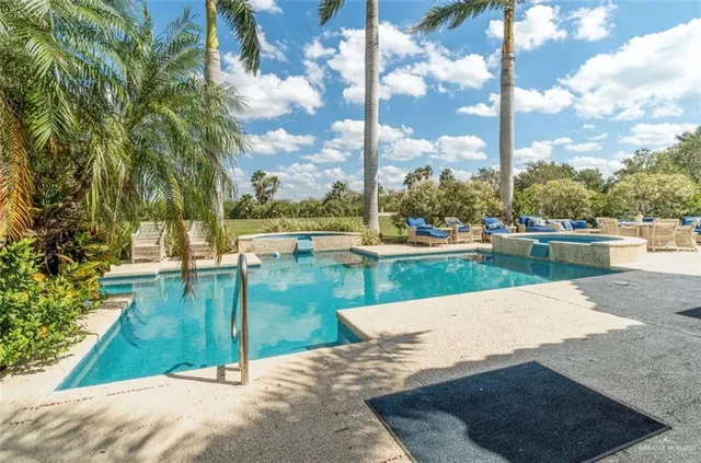 a view of a lake with a yard