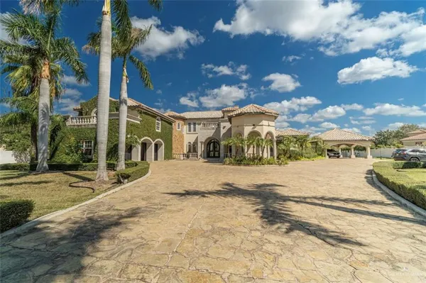 a front view of a house with swimming pool