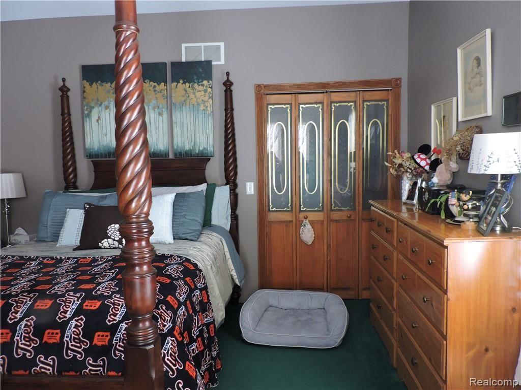6282 Todd Road Croswell, MI 48422 - Photo 14 of 34 Master bedroom walkin closet doors