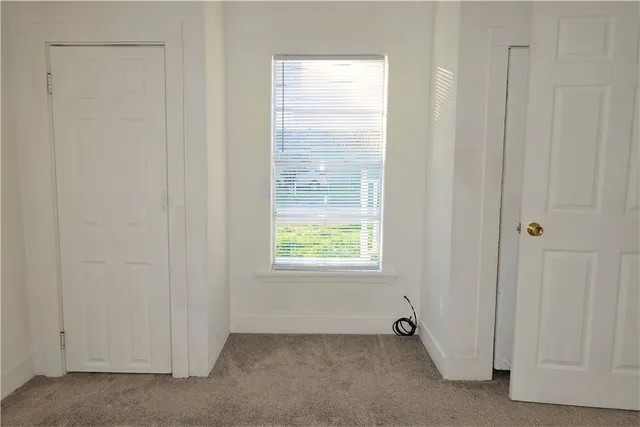 a view of an empty room with window