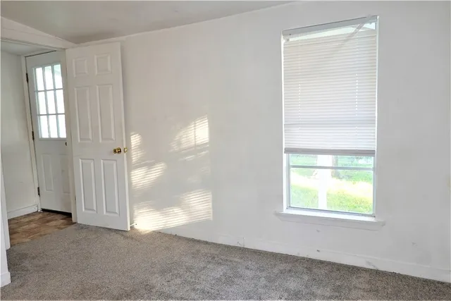 a view of a back yard of the house