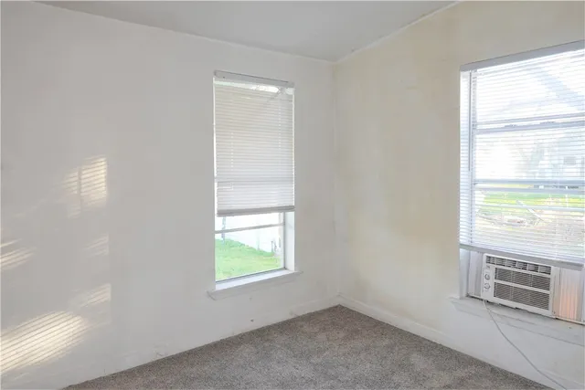 a front view of a house with a porch