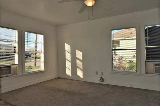 an empty room with windows