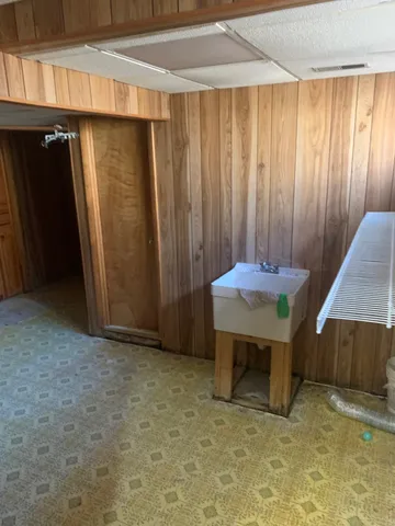 a view of room with a flat screen tv