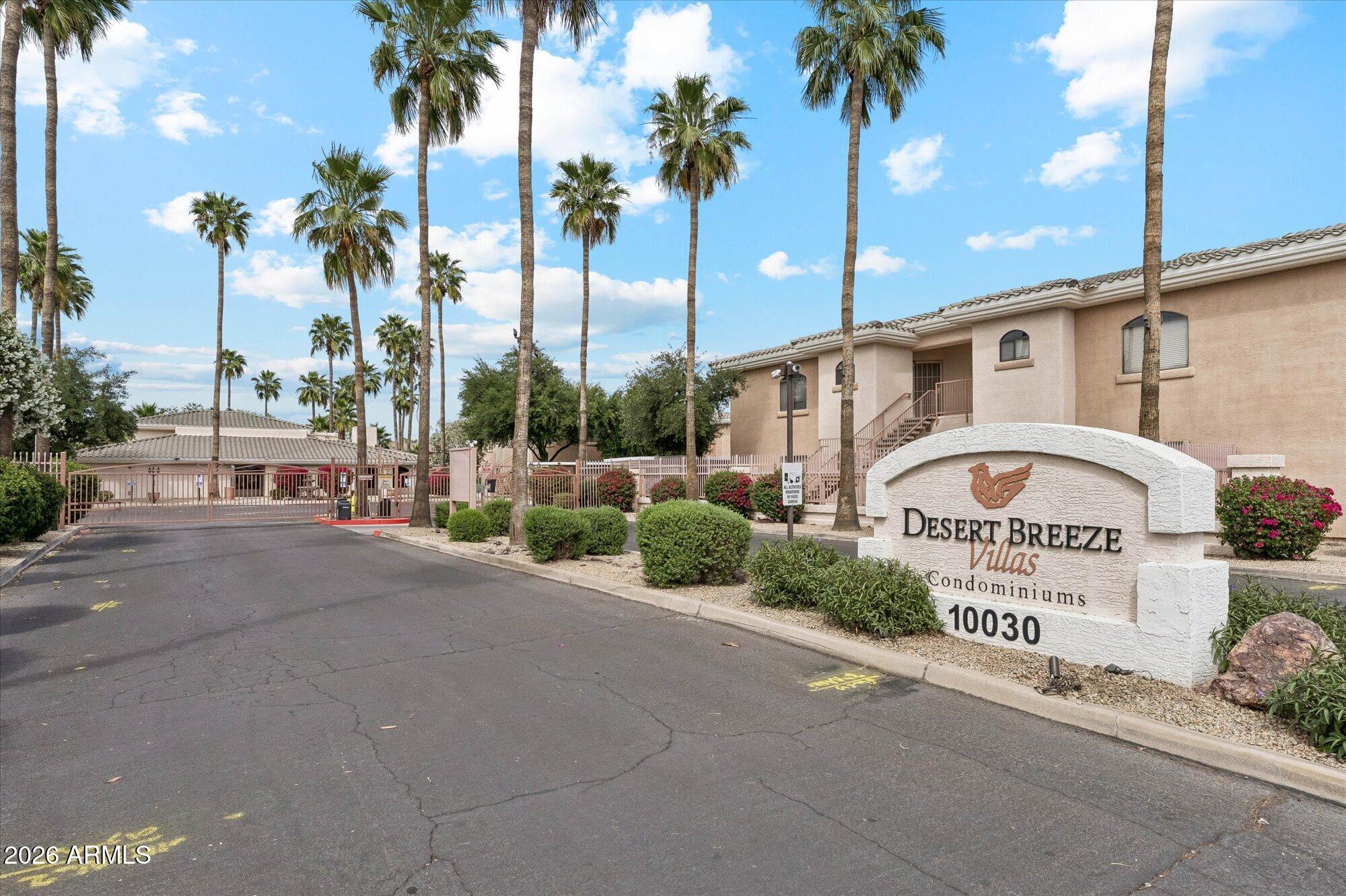 10030 West Indian School Road, Unit 269 Phoenix, AZ 85037 - Photo 26 of 29 a view of a street with a building in the background