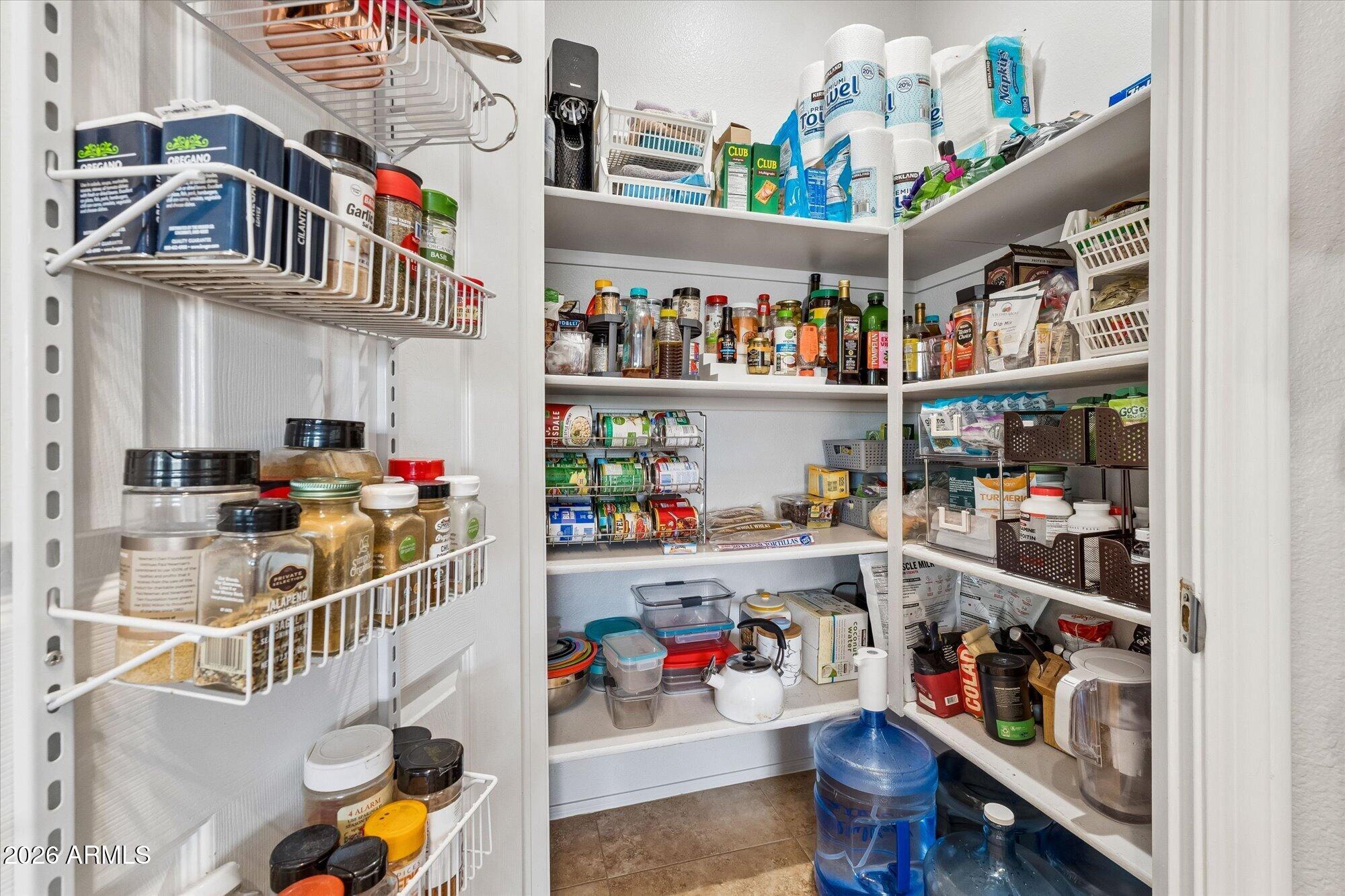 10030 West Indian School Road, Unit 269 Phoenix, AZ 85037 - Photo 5 of 29 a room with storage and a shelf