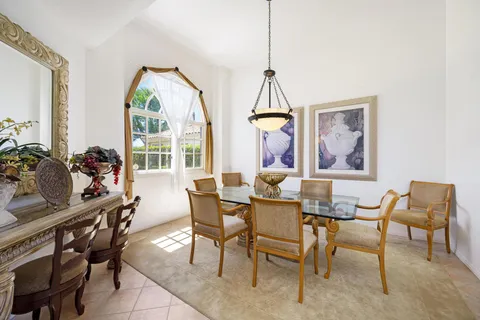 a kitchen with sink cabinets and stove