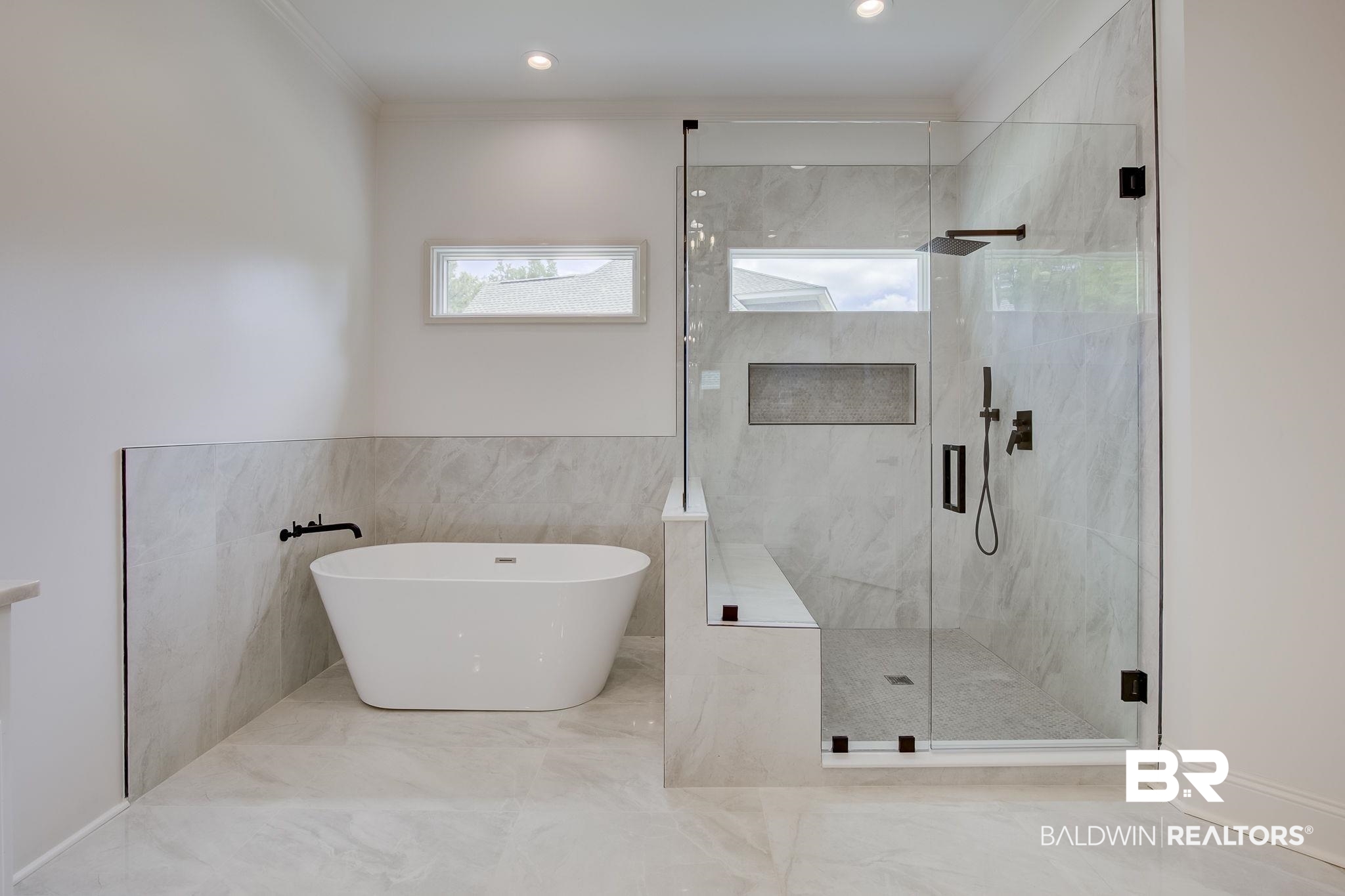 105 High Pines Ridge Fairhope, AL 36532 - Photo 54 of 97 Full bathroom with plenty of natural light, a marble finish shower, a freestanding bath, crown molding, and marble finish flooring