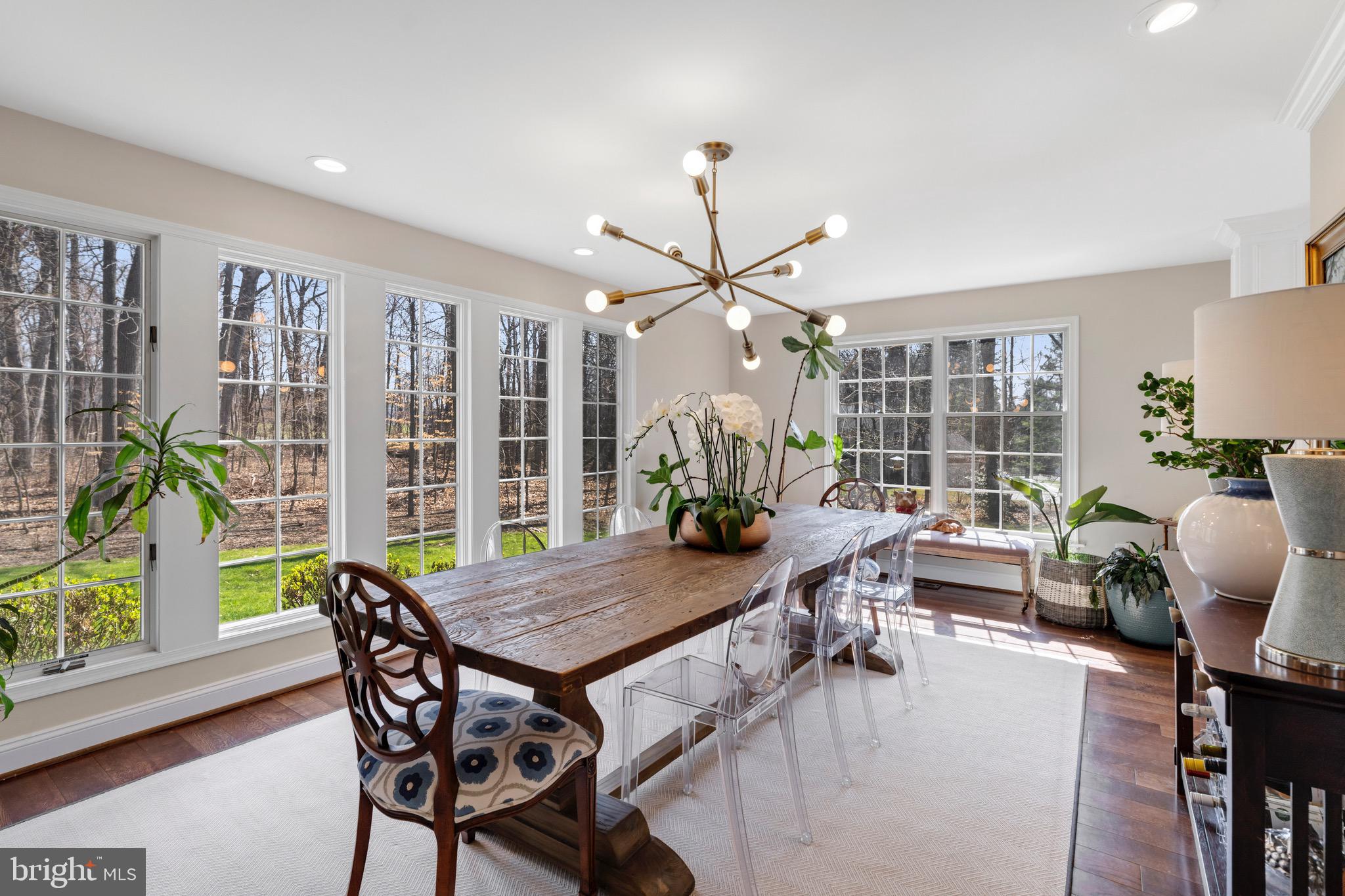 3618 Jackson Cabin Road Phoenix, MD 21131 - Photo 11 of 68 a view of a dining room with furniture window and wooden floor