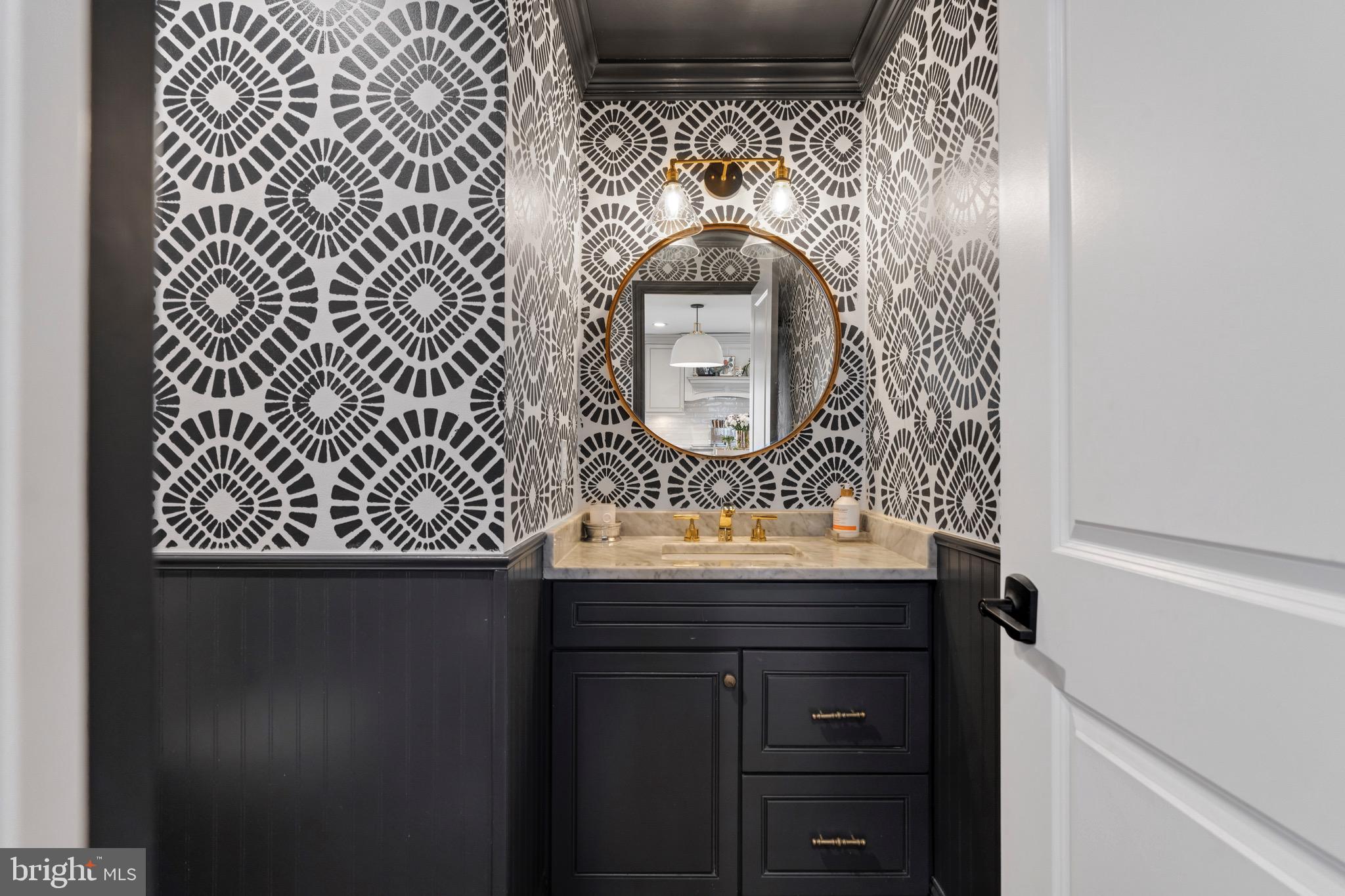 3618 Jackson Cabin Road Phoenix, MD 21131 - Photo 27 of 68 a bathroom with a sink and a mirror