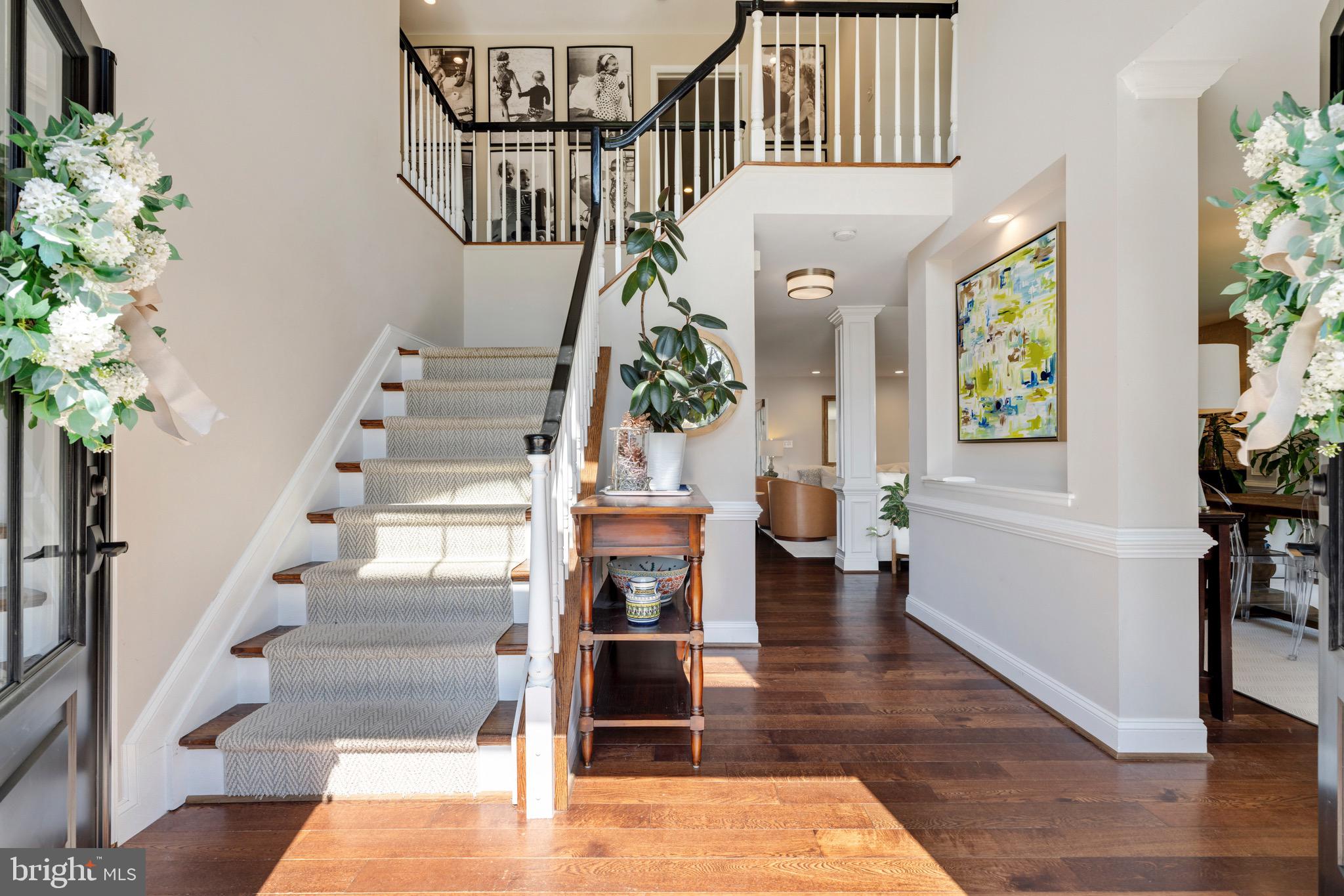 3618 Jackson Cabin Road Phoenix, MD 21131 - Photo 4 of 68 a view of an entryway with wooden floor and a potted plant