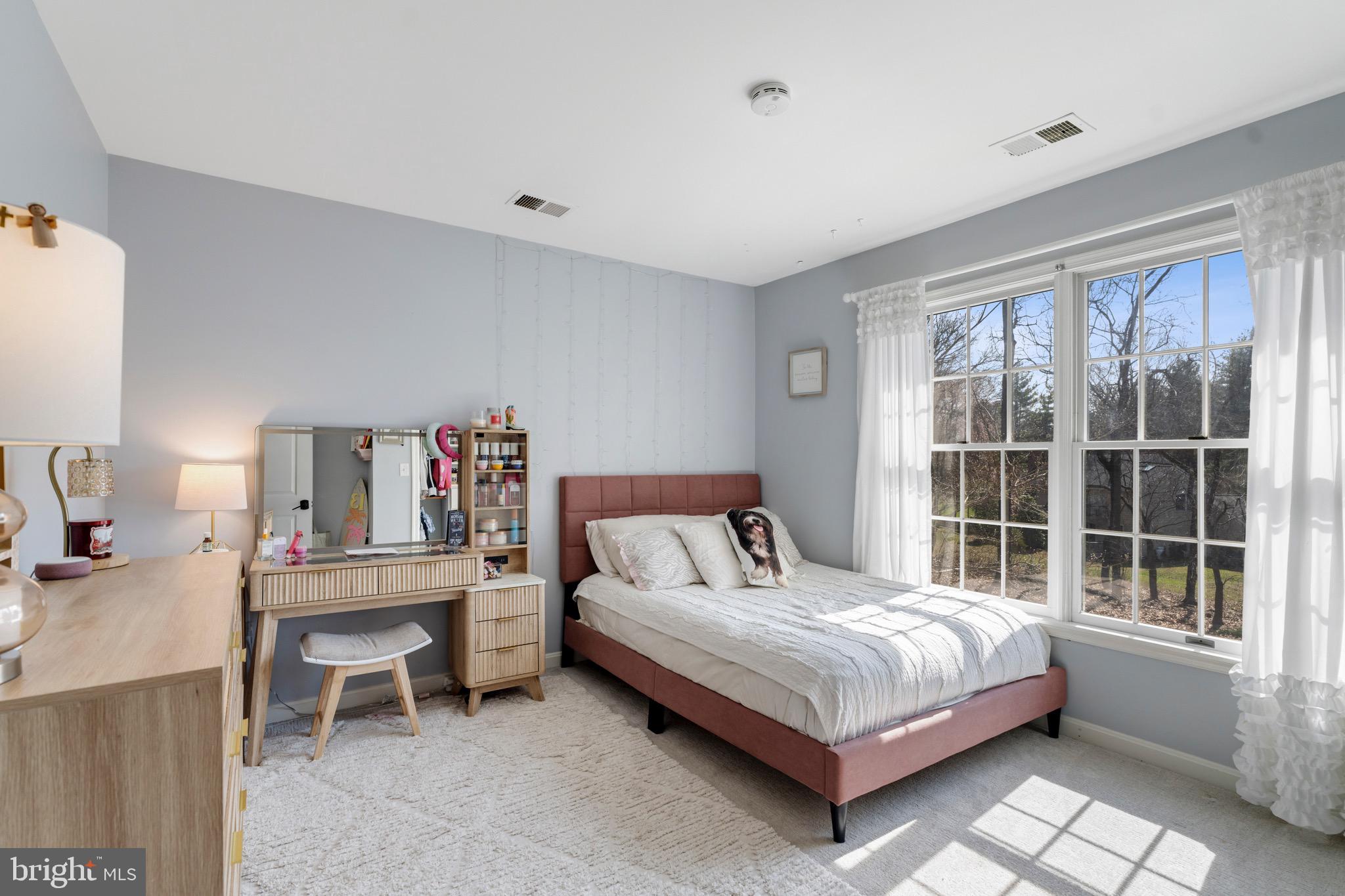 3618 Jackson Cabin Road Phoenix, MD 21131 - Photo 51 of 68 a bedroom with a bed table and a window