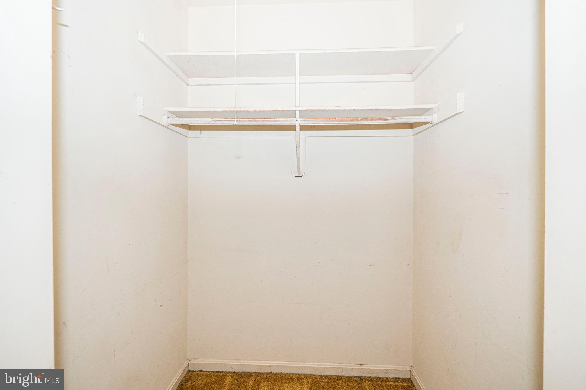 9610 Kanfer Court Gaithersburg, MD 20886 - Photo 26 of 41 a view of a room with racks on the wall