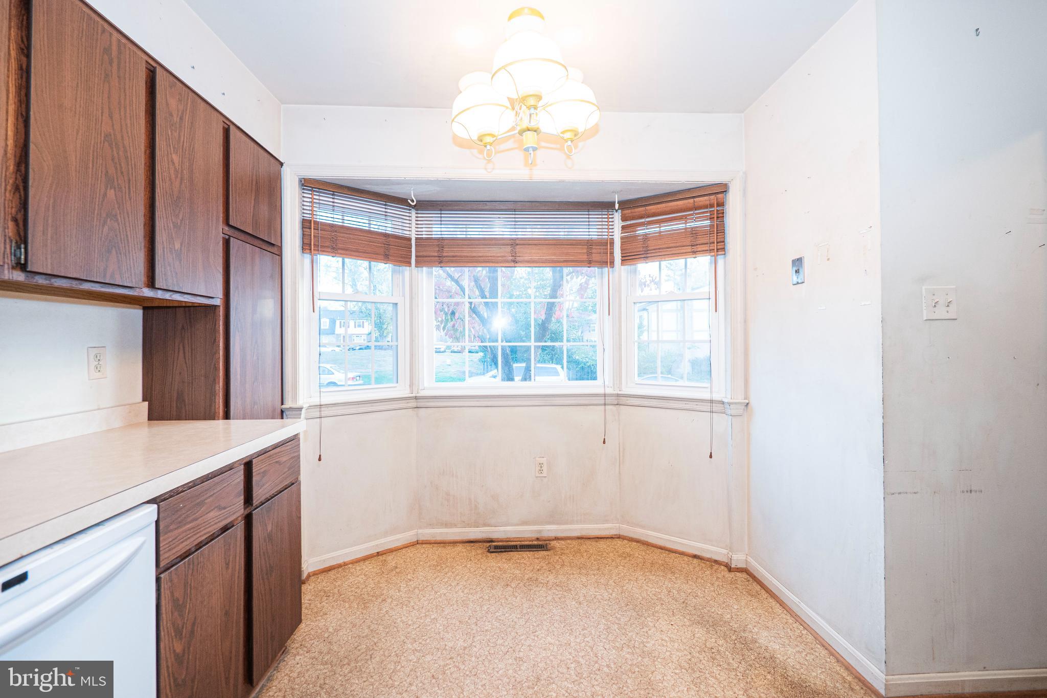 9610 Kanfer Court Gaithersburg, MD 20886 - Photo 7 of 41 a view of an empty room with a window