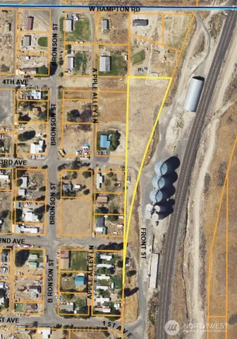 a view of a lake with lots of green space