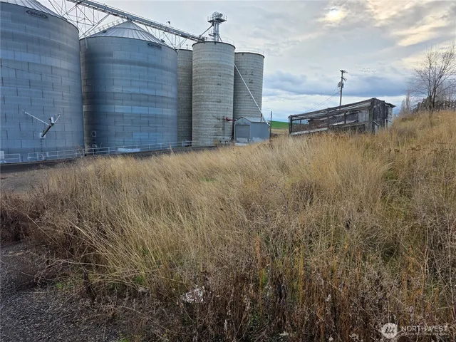 a view of an outdoor space and a lake view in back