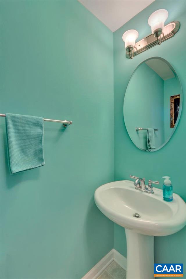 474 Rolkin Road Charlottesville, VA 22911 - Photo 11 of 42 a bathroom with a sink and mirror