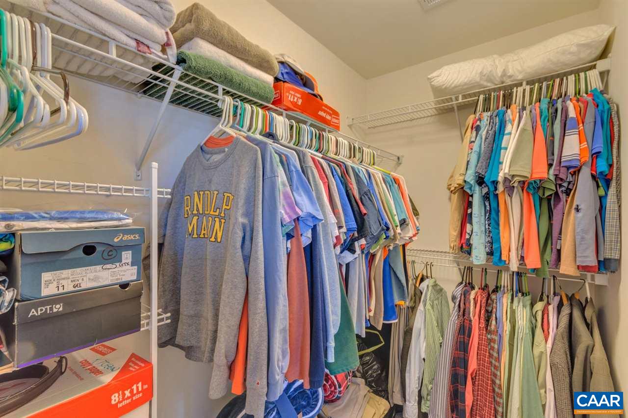 474 Rolkin Road Charlottesville, VA 22911 - Photo 14 of 42 a view of walk in closet with clothes and shoes