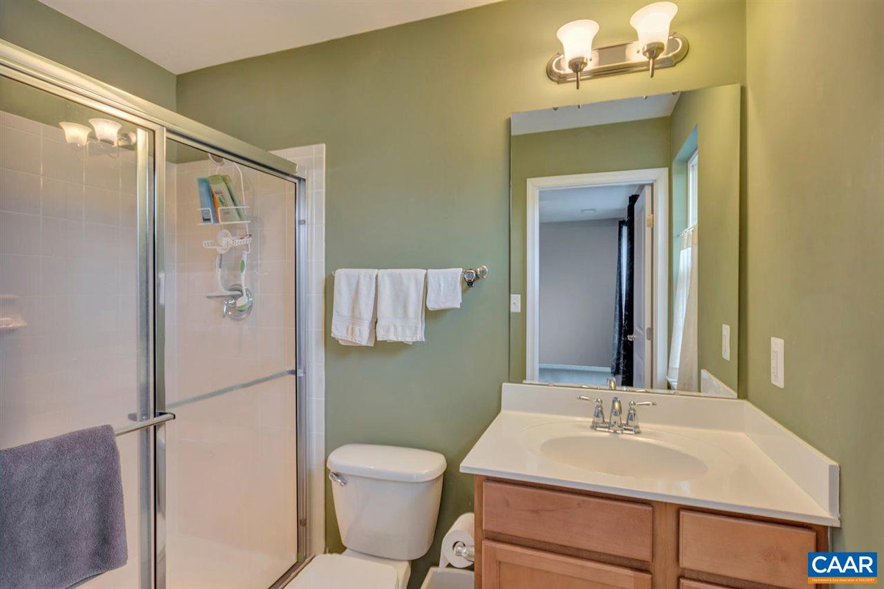 474 Rolkin Road Charlottesville, VA 22911 - Photo 15 of 42 a bathroom with a sink toilet and mirror