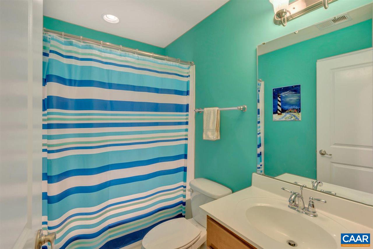 474 Rolkin Road Charlottesville, VA 22911 - Photo 19 of 42 a bathroom with a sink toilet and a mirror