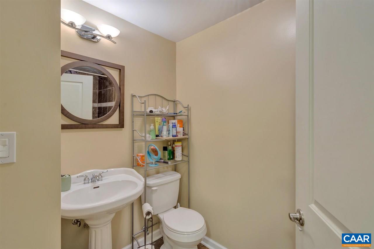 474 Rolkin Road Charlottesville, VA 22911 - Photo 24 of 42 a bathroom with a toilet a sink and mirror